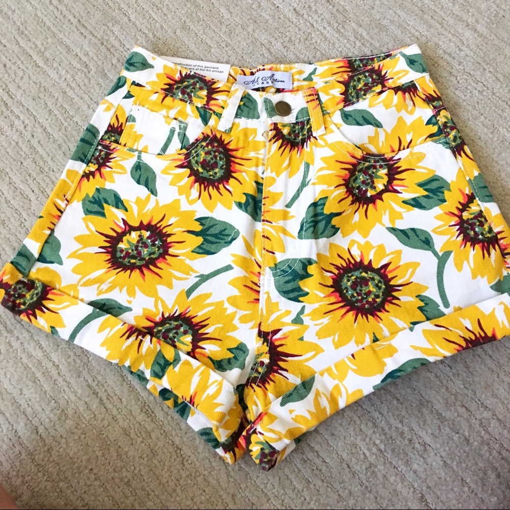 Aili Artisan sunflower high-rise jean shorts. 